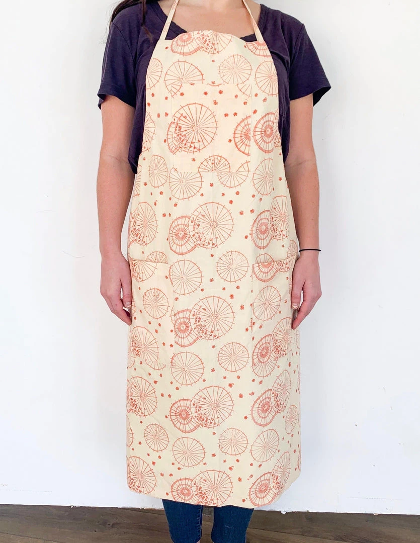 Symbology Dancing Umbrellas + Ginkgo Leaf Reversible Apron Home Goods 3 Symbology Dancing Umbrellas + Ginkgo Leaf Reversible Apron Home Goods