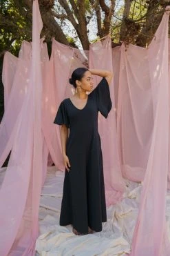 Mien Villa Flutter Sleeve Jumpsuit Clothing